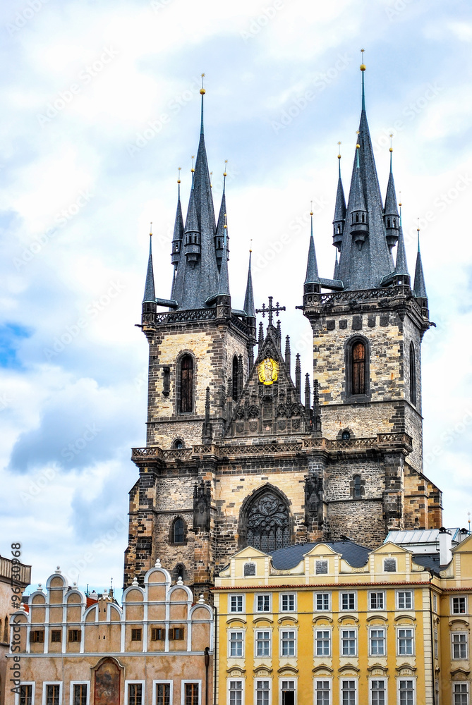 Fototapeta premium The Tyn Church in the blue sky in Prague. Located on the Old Town Square, the main parish church district Nove Mesto.