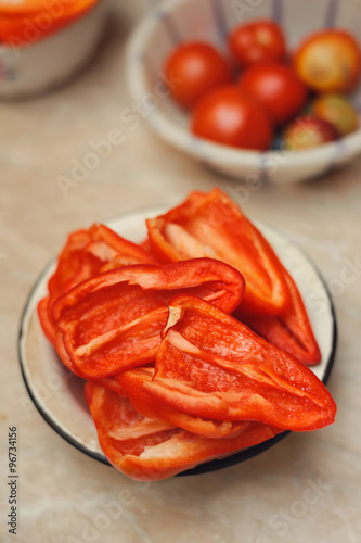 cut red peppers into plate