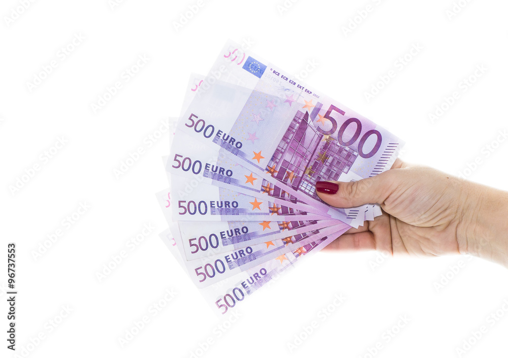 hand holding 500 euro money isolated on white background hand holding 500 euro money isolated on white background