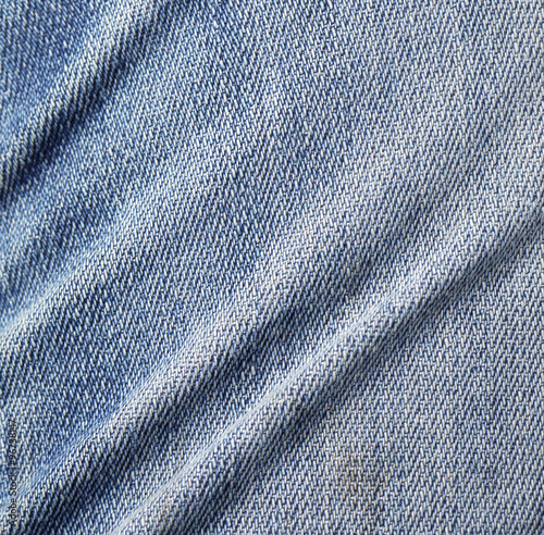 Blue jeans texture close-up background