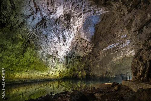 Underground river passing a dome in Planina Cave