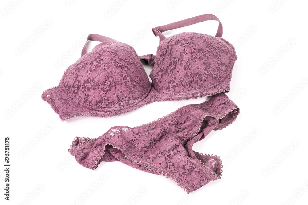 Conjunto Ropa Interior de mujer de color rosa lencería sobre fondo blanco  aislado. Vista superior Stock Photo | Adobe Stock