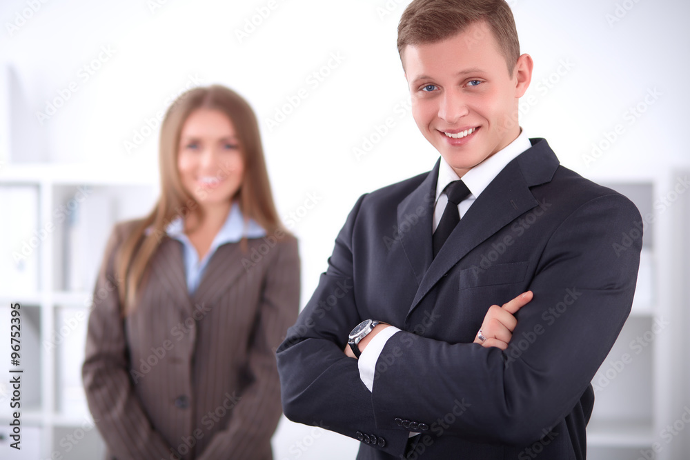 Face of beautiful businessman on the background of business people Face of beautiful businessman on the background of business people