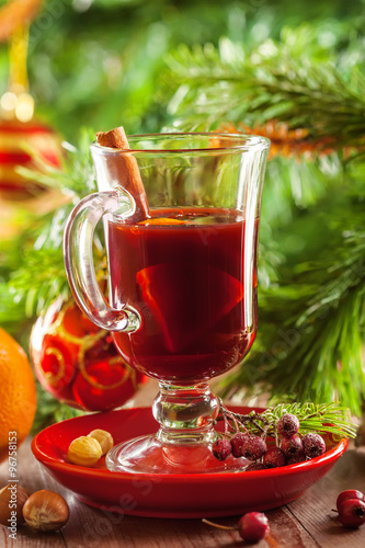 Traditional Christmas hot drink. Mulled wine for New Year Eve celebration party.