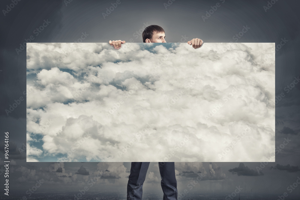 Fototapeta premium Businessman showing banner