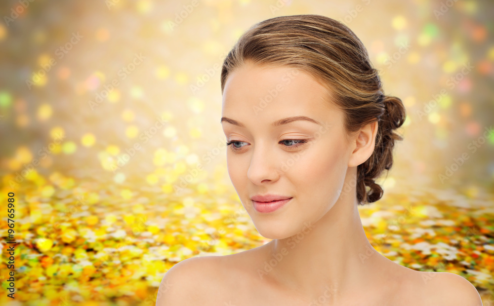 Fototapeta premium smiling young woman face and shoulders