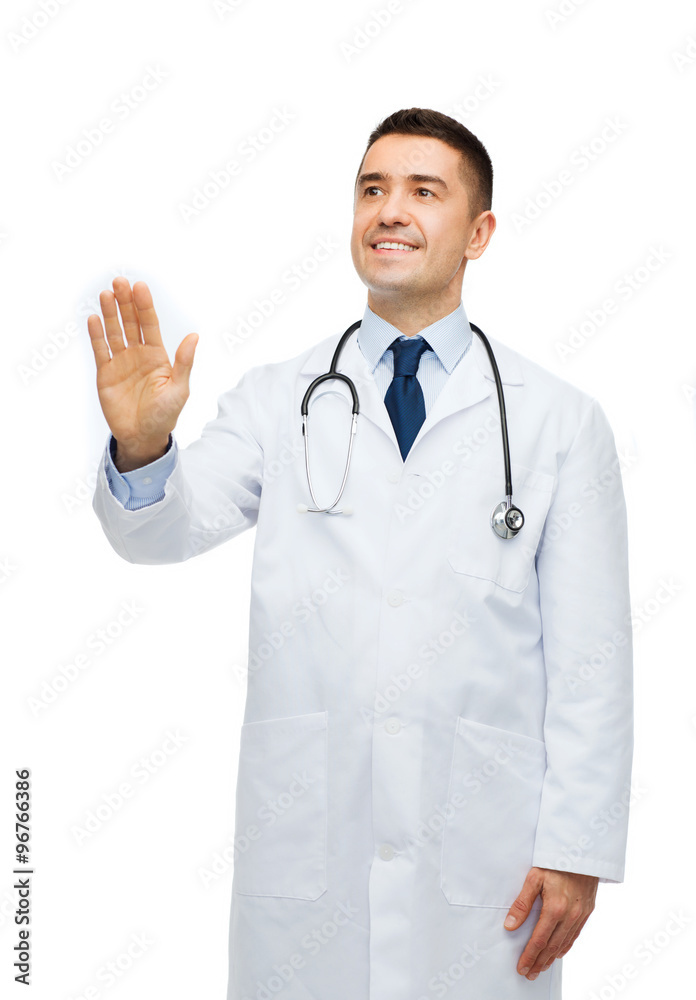 smiling male doctor touching something smiling male doctor touching something