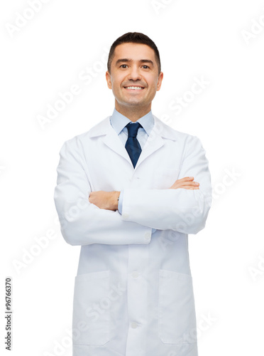 smiling male doctor in white coat