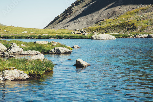 Backpacking in the mountains in the Caucasus, the Agur lake photo