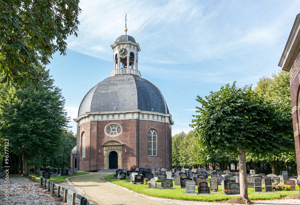 Dome church with churchyard in the Frisian town of Berlikum in Friesland, Netherlands Dome church with churchyard in the Frisian town of Berlikum in Friesland, Netherlands