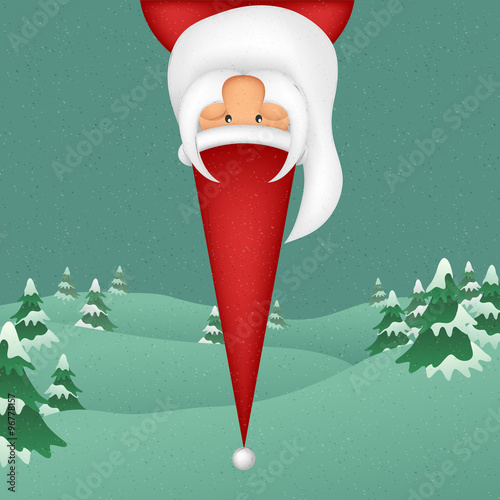 Santa Claus hanged upside down with snowy, winter background