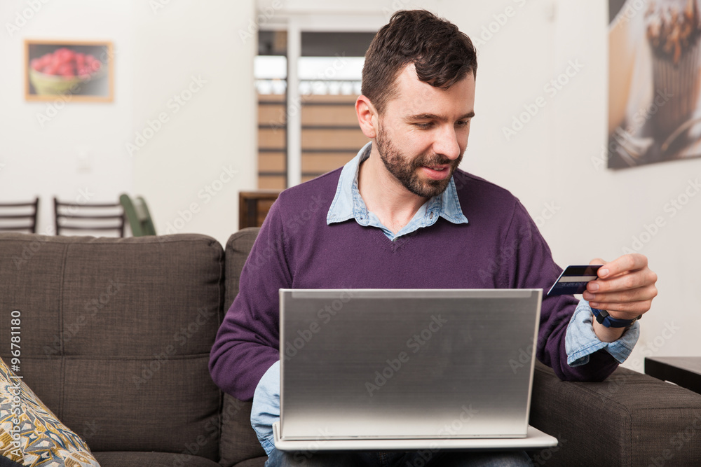 Man buying stuff online Man buying stuff online