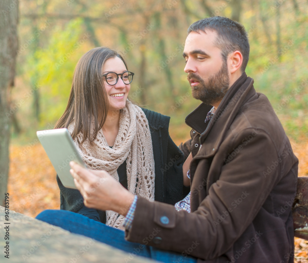 Fototapeta premium Young couple with tablet computer