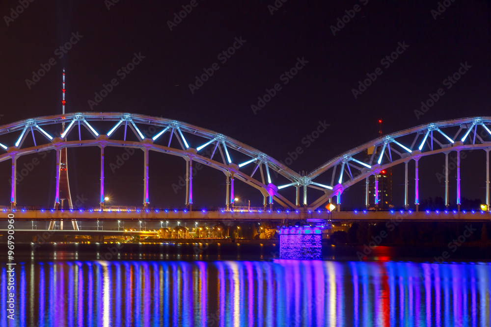 Obraz premium Riga. Railway bridge at night.