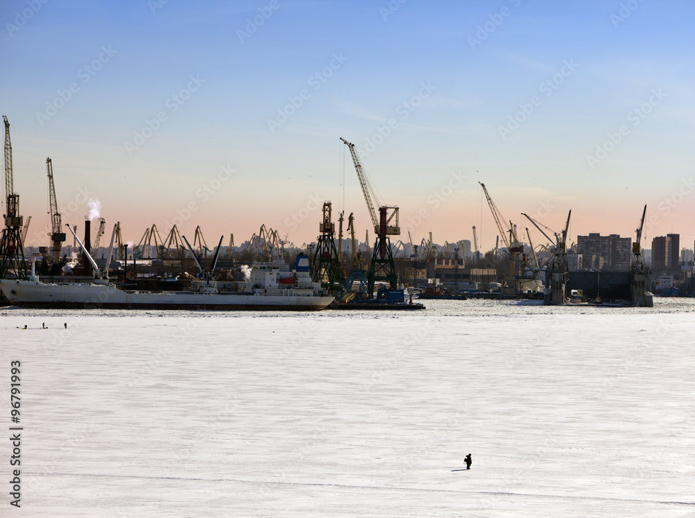 St. Petersburg. Seaport. Russia.View from the Gulf of Finland covered with ice ..