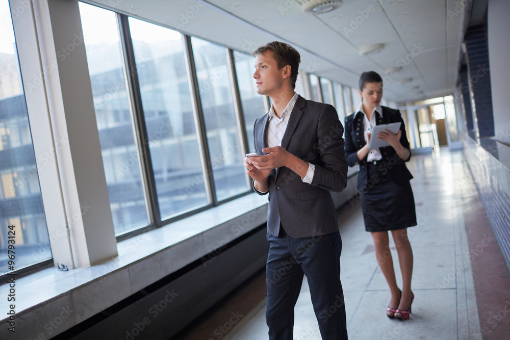 business woman with tablet and businessman with telephone business woman with tablet and businessman with telephone