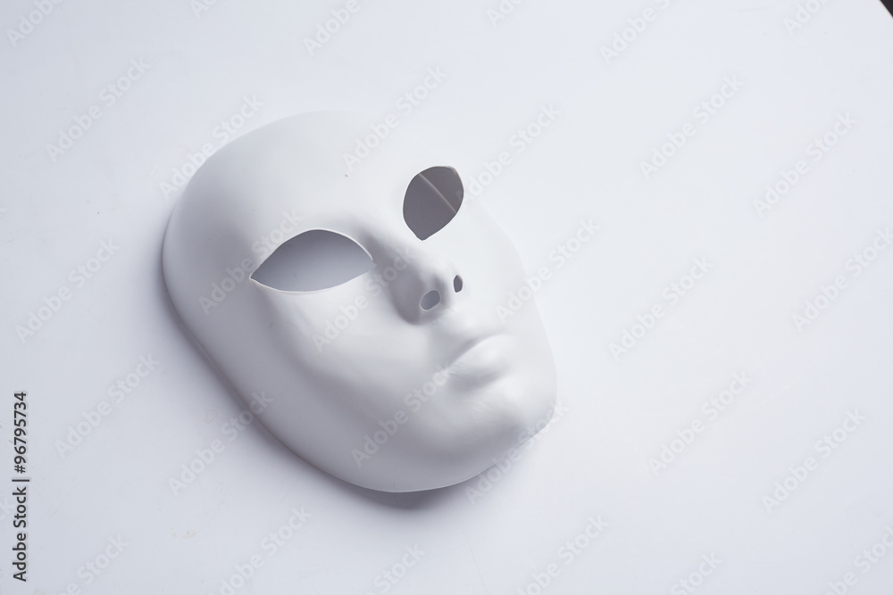 Naklejka premium white venetian mask on a white background