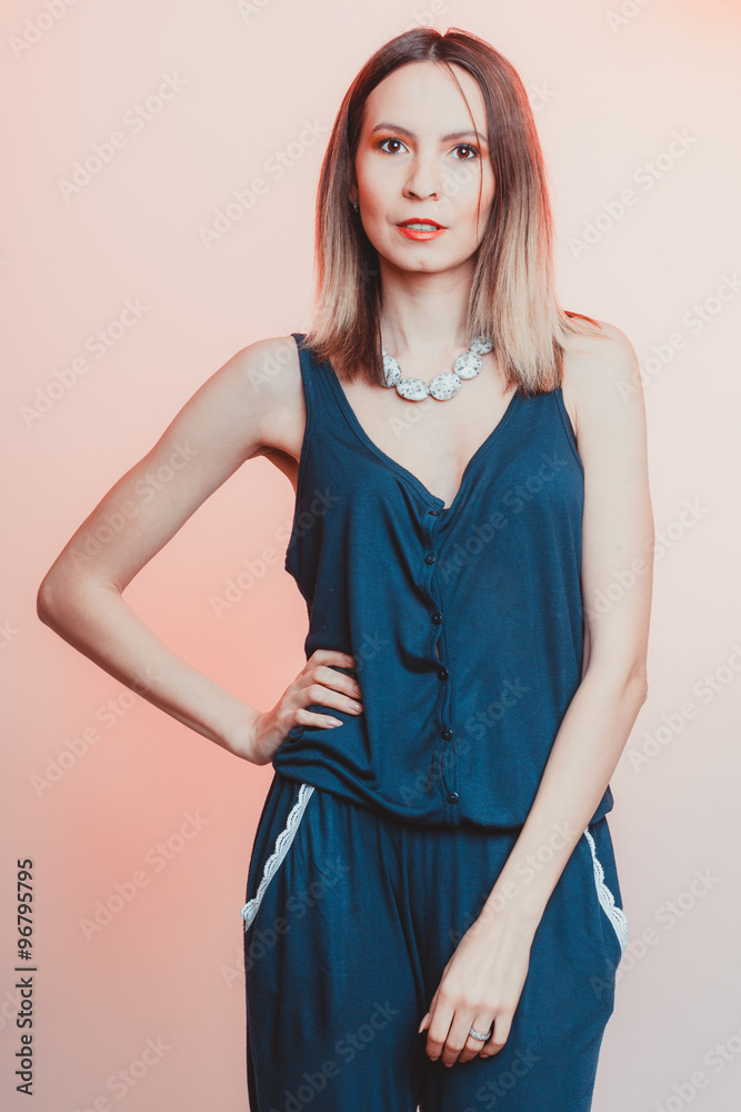Portrait of attractive woman in overalls. Portrait of attractive woman in overalls.