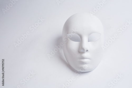 white venetian mask on a white background