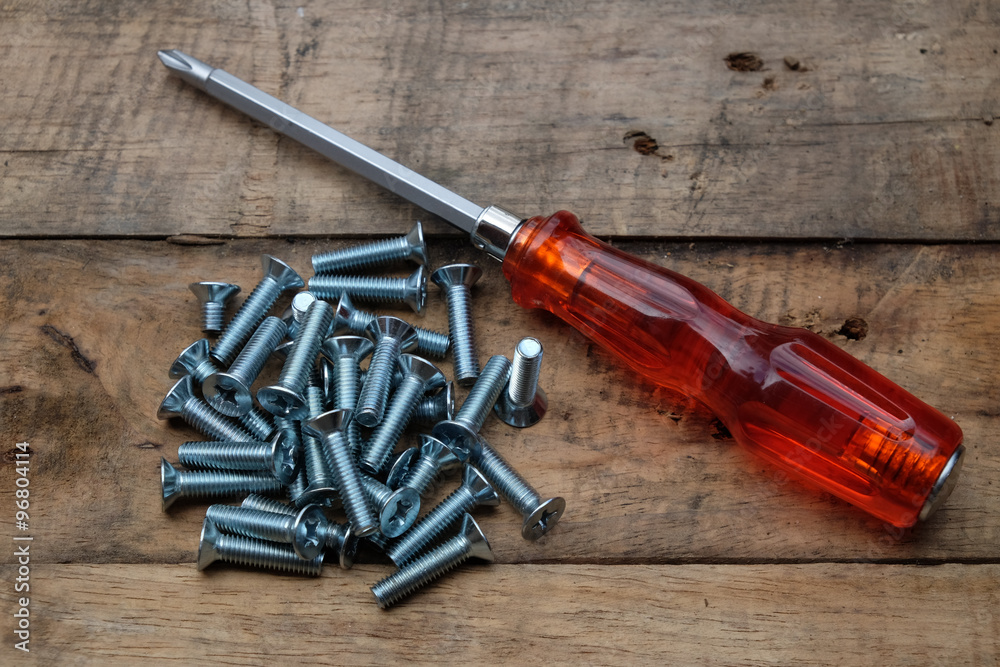screwdriver on wood floor 