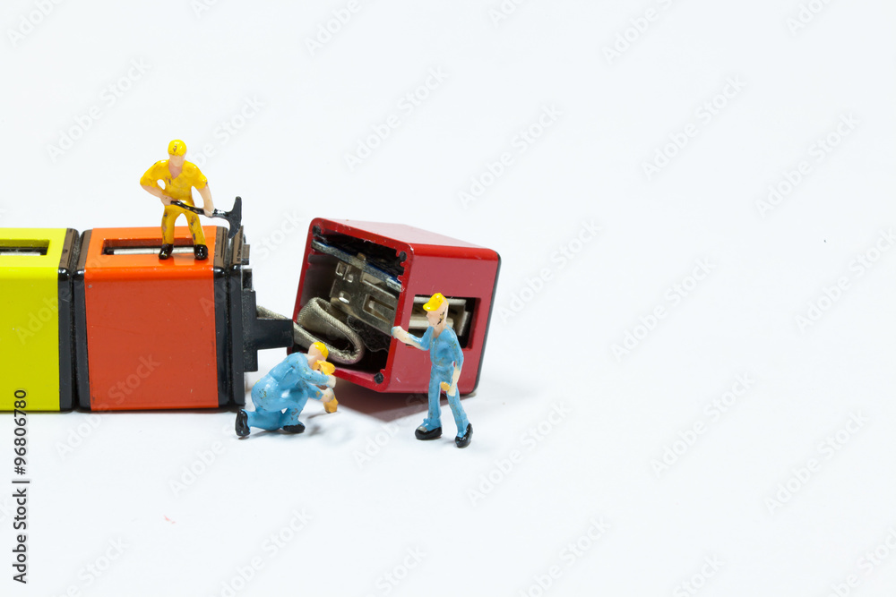 Under construction and teamwork concept - construction workers performing repair broken parts Under construction and teamwork concept - construction workers performing repair broken parts