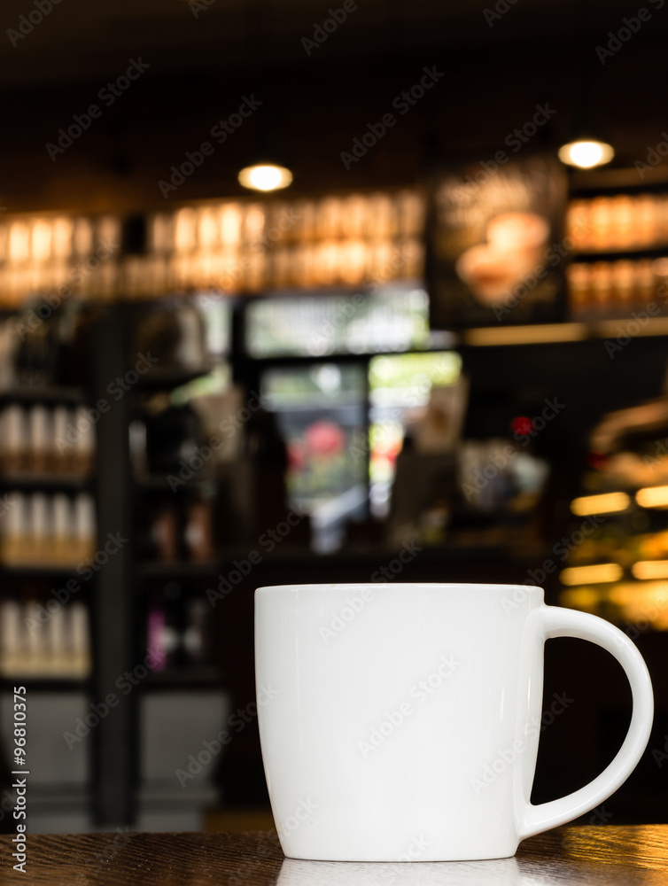 White Coffee Mug On Wooden Table In Cafe With Copyspace