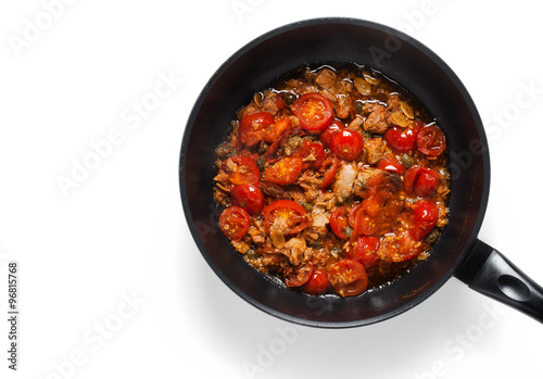 sauce with tuna, capers and cherry tomatoes. for cooking spaghet