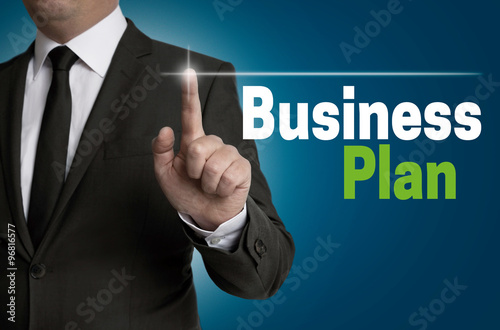 Businessplan touchscreen is operated by businessman concept