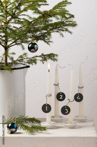 1. Advent. Cristmas decorations with advent candles. photo