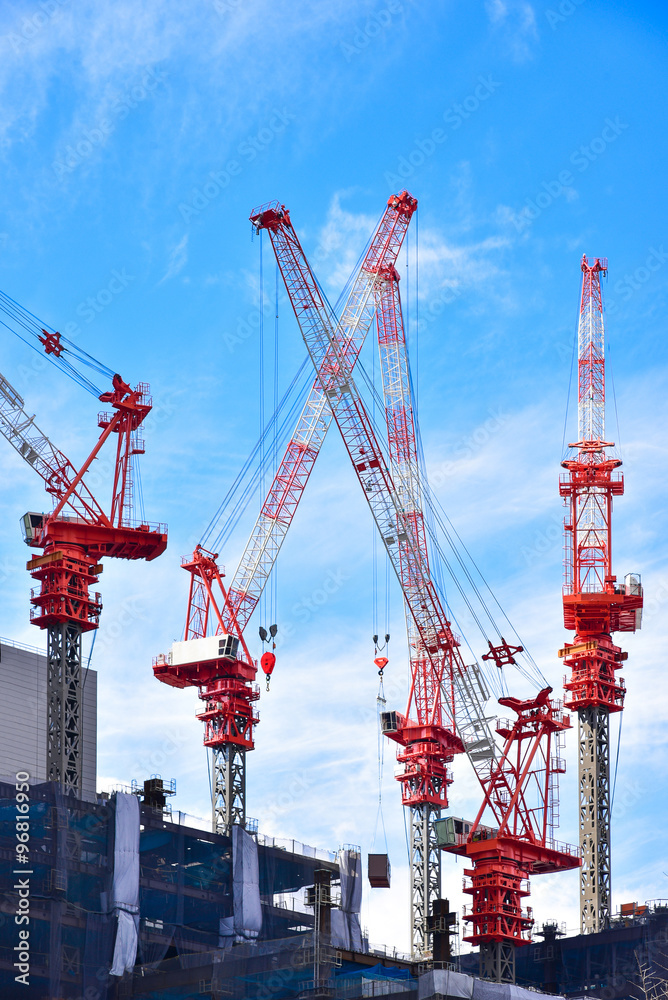 construction cranes on top of building construction cranes on top of building