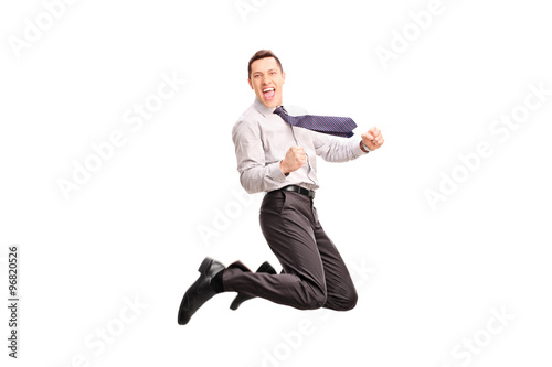 Overjoyed businessman jumping