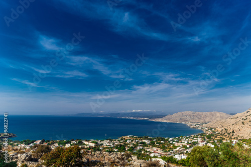 Greece, island Rhodes. Top view to the sea and village Pefkos