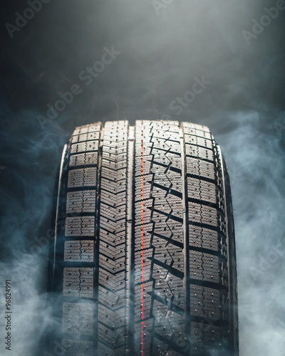 winter tire in smoke photo