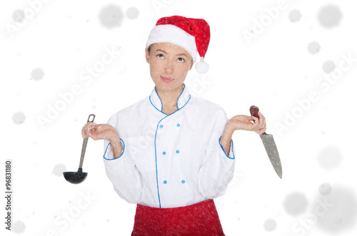 doubters asian chef in christmas cap with container under snow photo