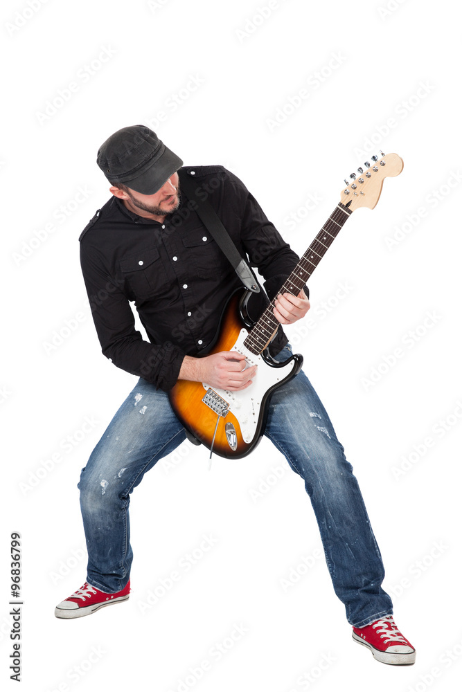 Naklejka premium Musician playing electric guitar with enthusiasm. Isolated on white