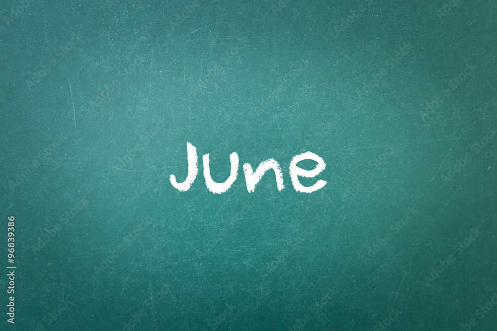Green blackboard wall texture with a word June Green blackboard wall texture with a word June