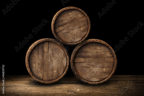Beer barrel with beer glasses on a wooden table. 
