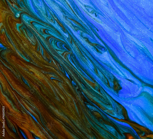 Flow of Blue and Red Liquid Creating Wrinkled Surface