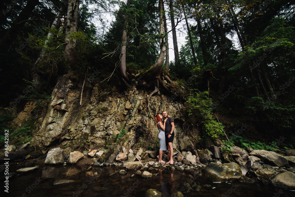 beautiful couple on the background of forest beautiful couple on the background of forest