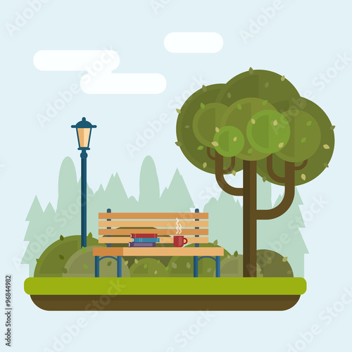 Bench under a tree in the park. 
