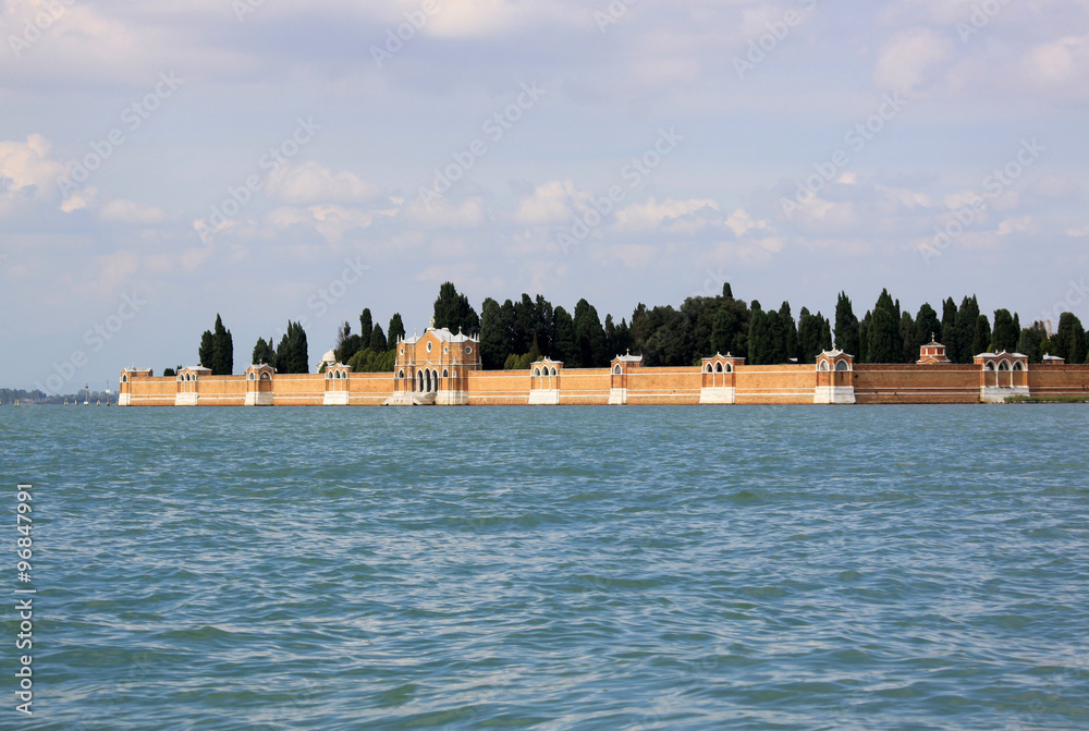 Fototapeta premium VENICE, ITALY - SEPTEMBER 02, 2012: View from the Venice lagoon on the wall of cemetery island of San Michele, Venice, Italy