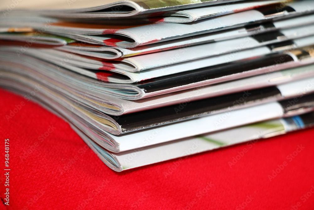 Magazines on the red sofa Magazines on the red sofa
