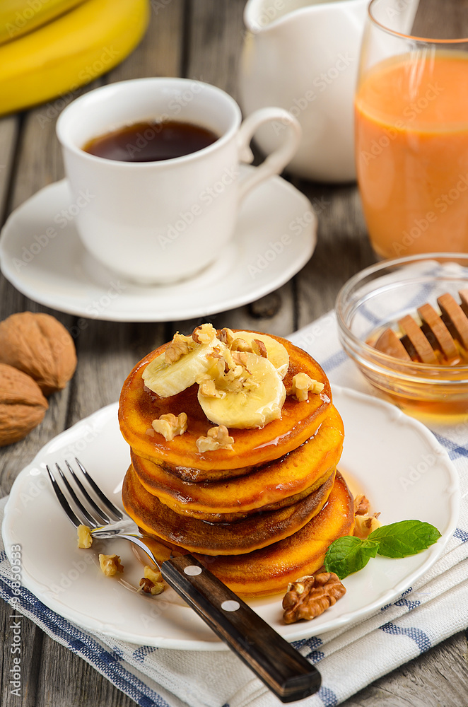 Pumpkin pancakes with bananas and walnuts Pumpkin pancakes with bananas and walnuts