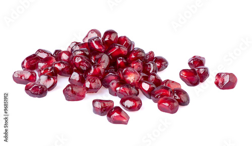 Pomegranate seeds on  white background