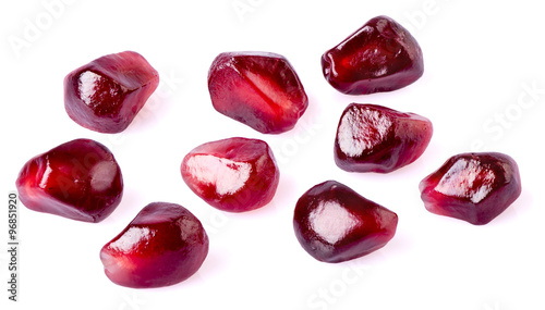 Pomegranate seeds on  white background