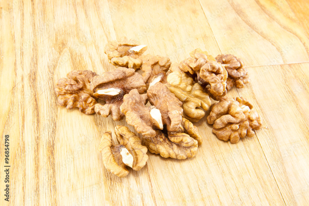 Walnuts on wood. Walnuts on wood.