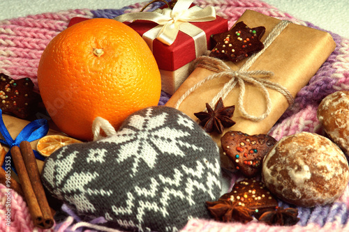 Heart shape, christmas gift boxes, orange, cookies and winter scarf