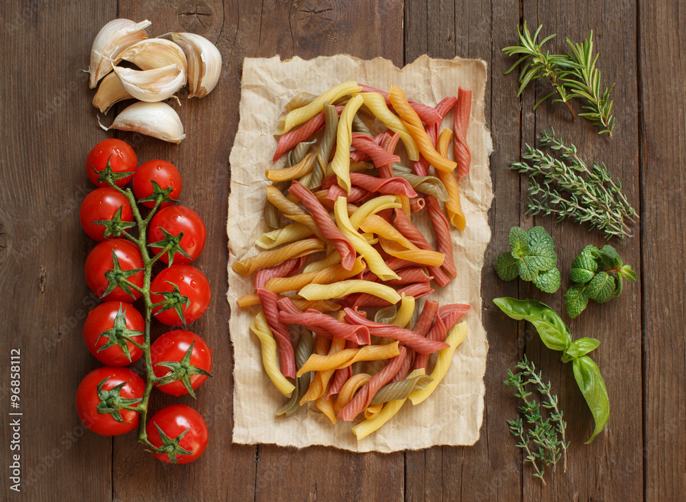 Colorful pasta, vegetables and herbs Colorful pasta, vegetables and herbs