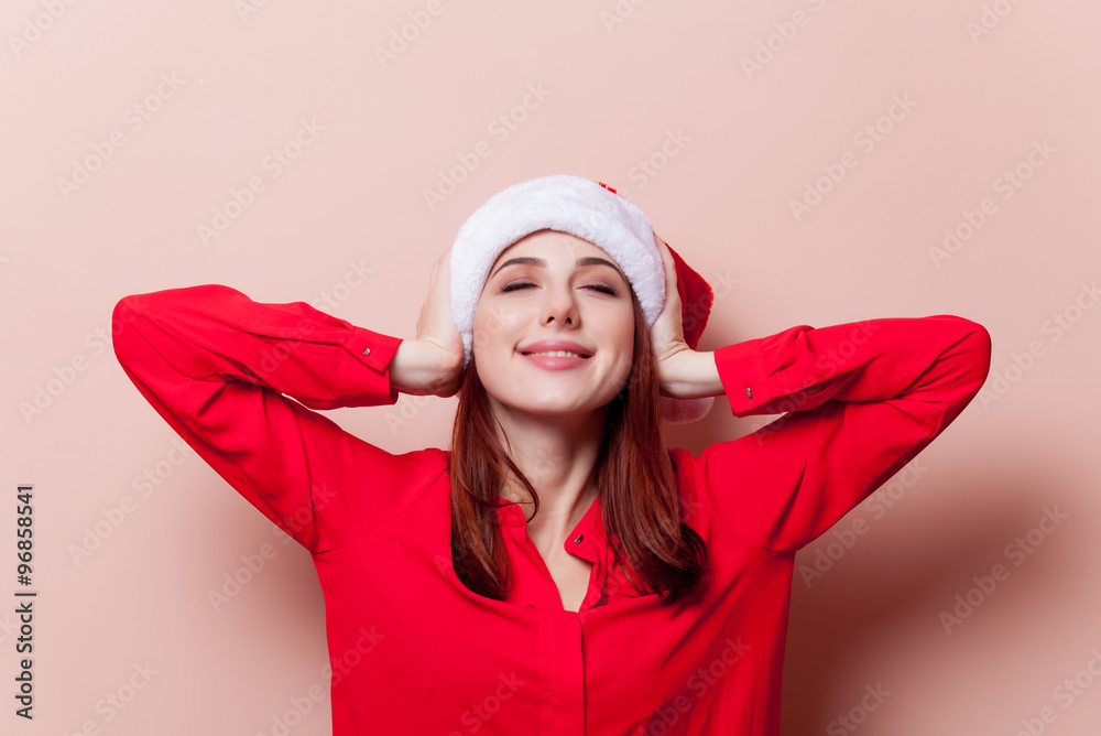 woman in Santa Claus hat woman in Santa Claus hat