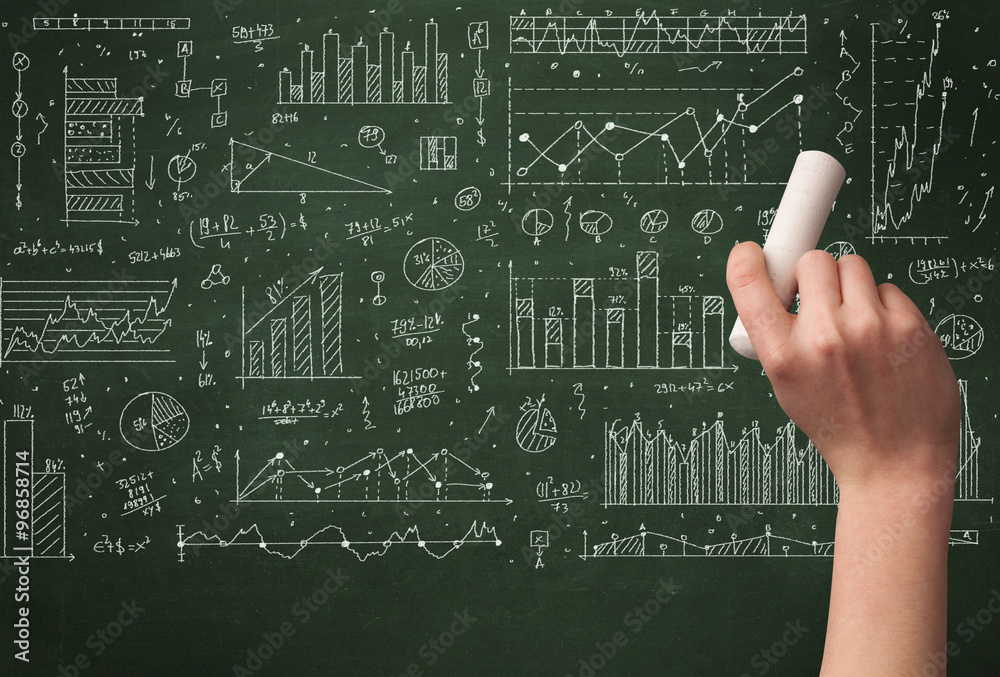 A business person drawing data on chalkboard